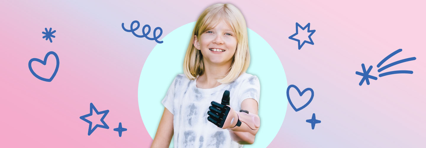 Image of kid wearing pink prosthetic arm